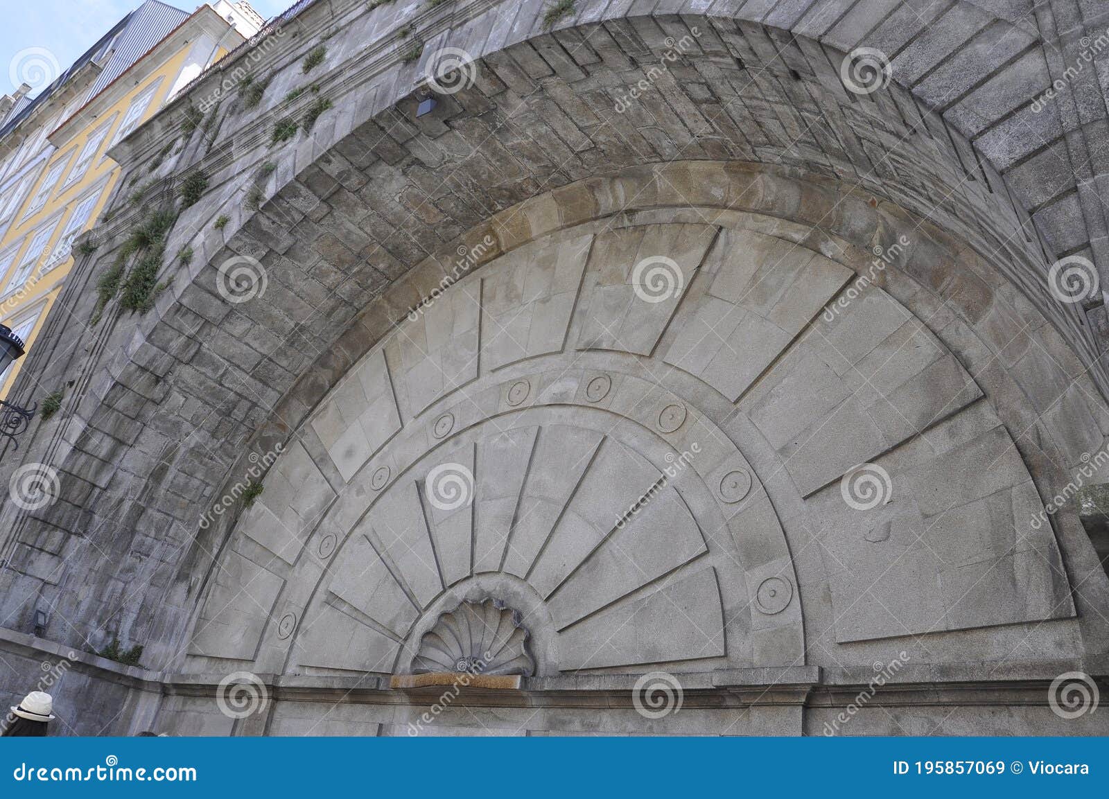 historic fountain from rua de mouzinho da silveira street in downtown of porto in portugal