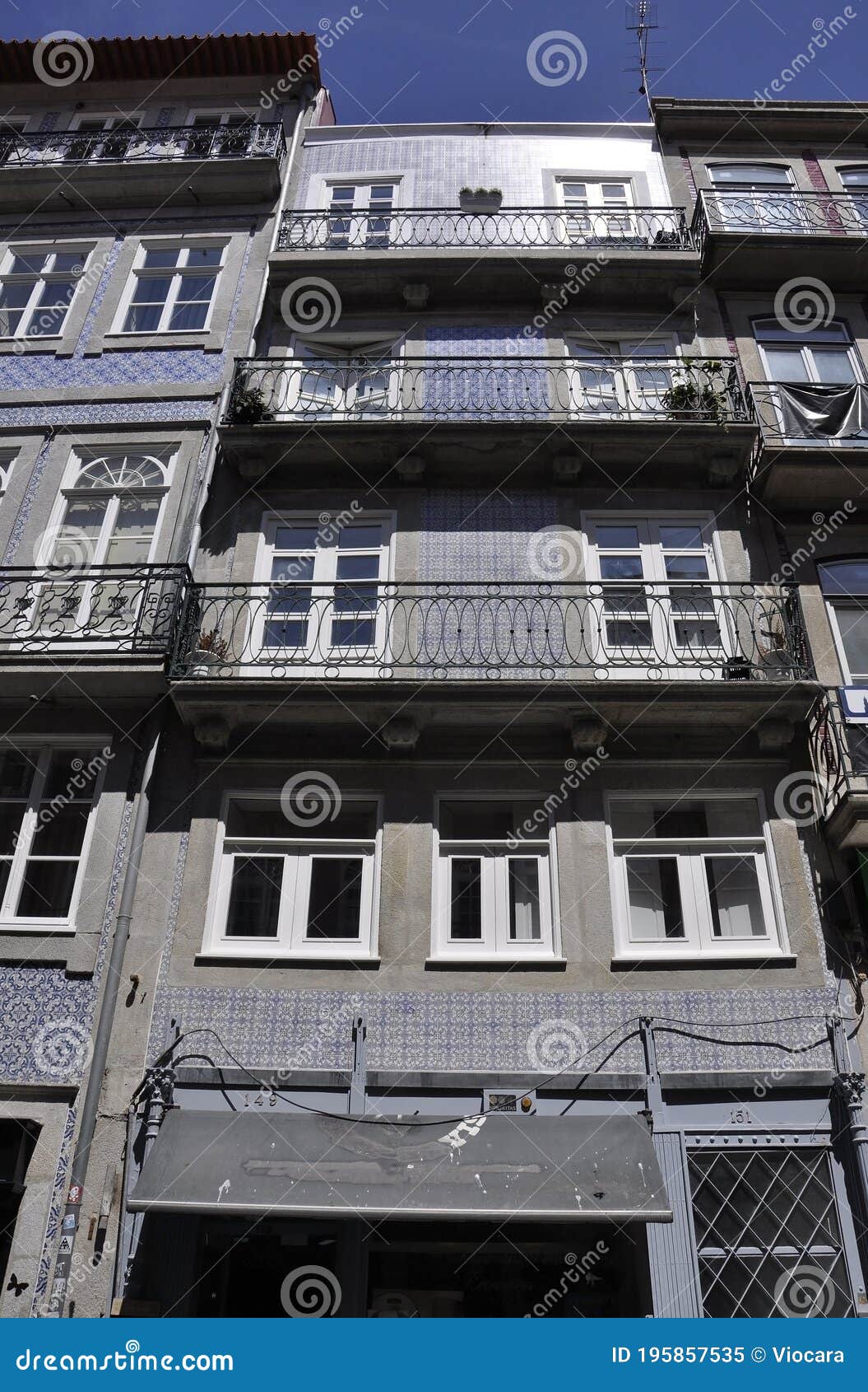 historic houses from rua de mouzinho da silveira street in downtown of porto in portugal