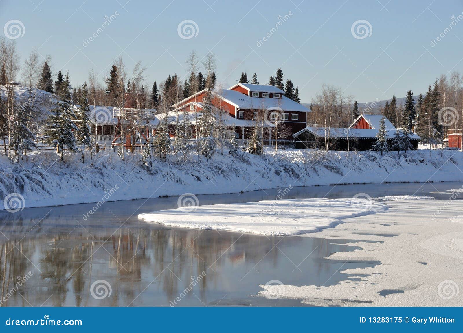 historic pioneer park by the river in winter