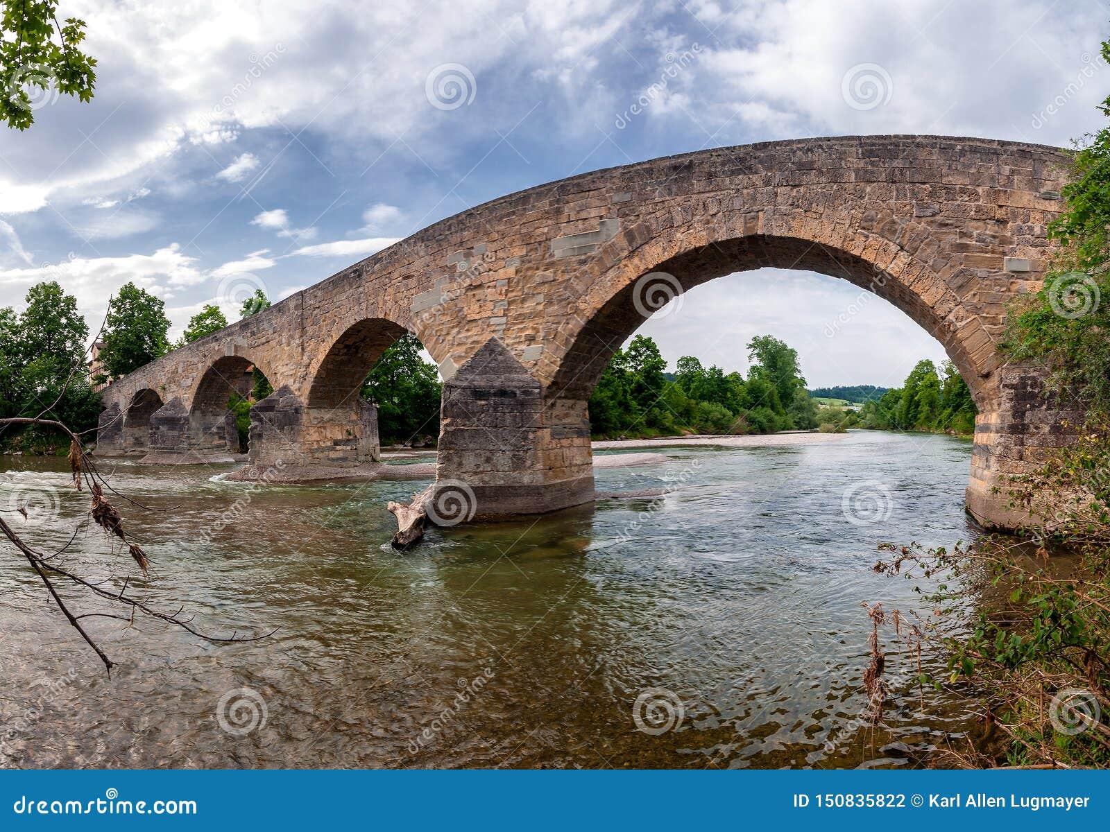 historic stone bridge over the river thur