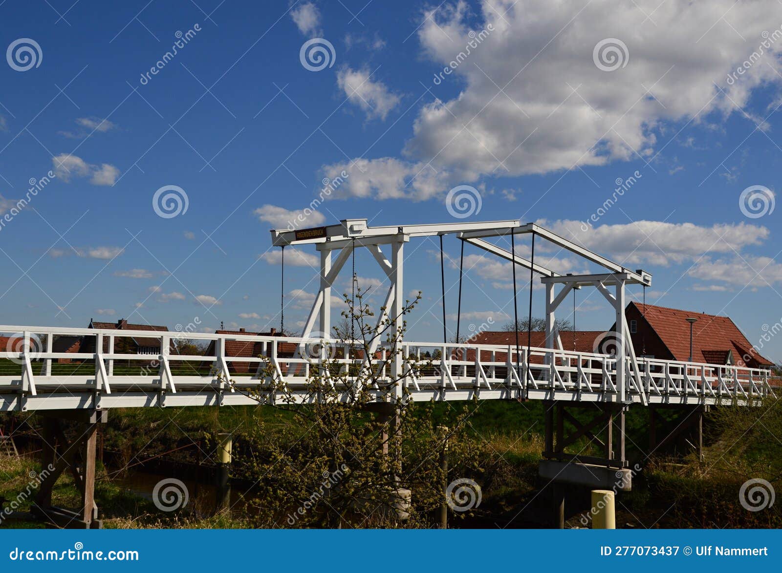 historical bridge in spring in the old country, steinkirchen, lower saxony