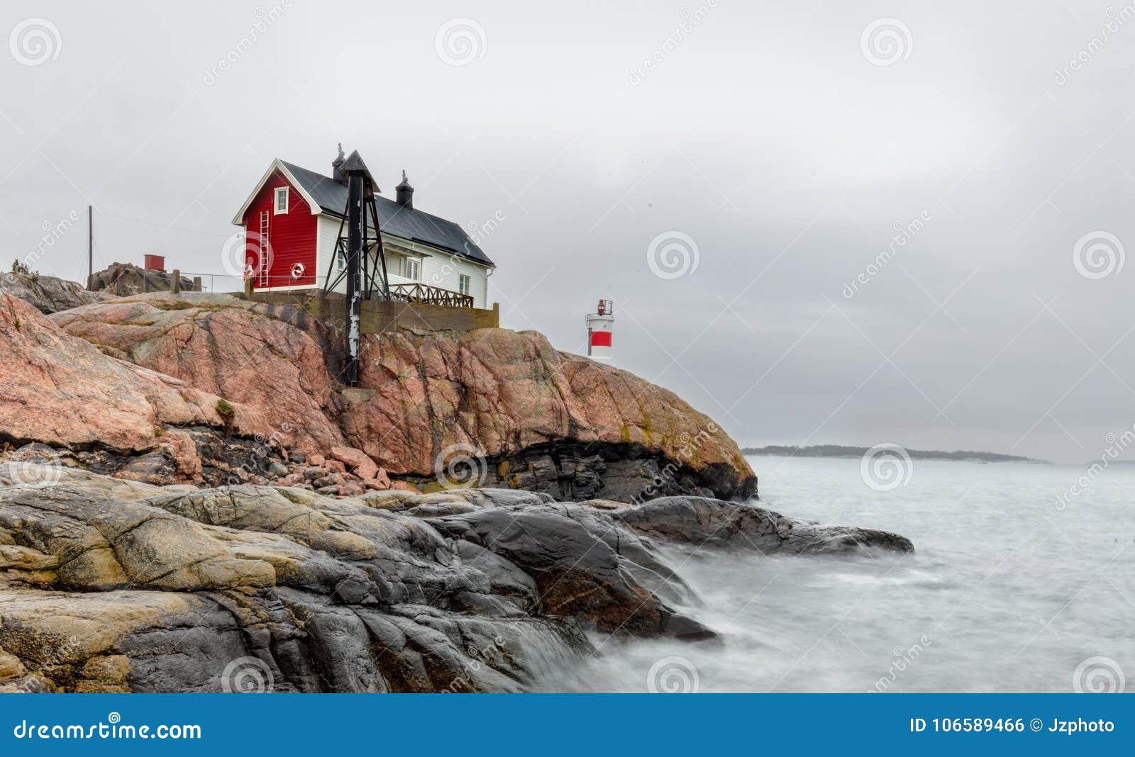 historical building and small lighthouse in the area of femÃÂ¶re, sweden