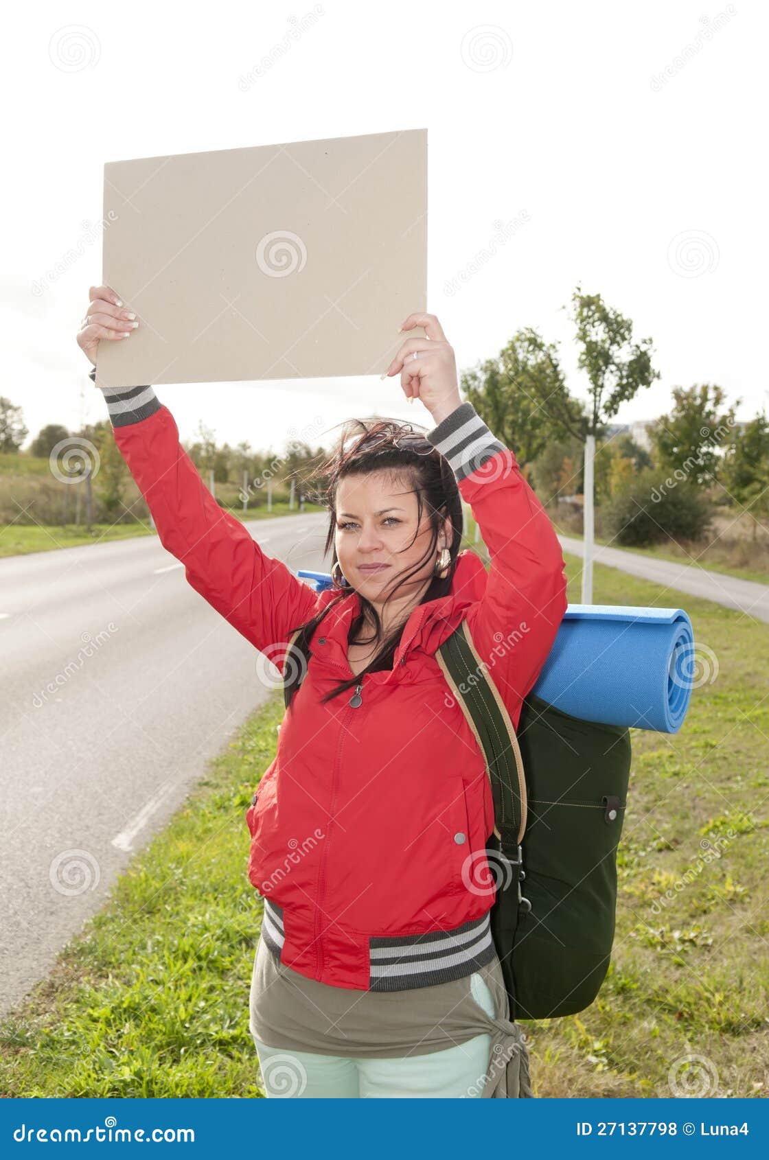 Hitchhiker with blank sign stock photo. Image of green 27137798