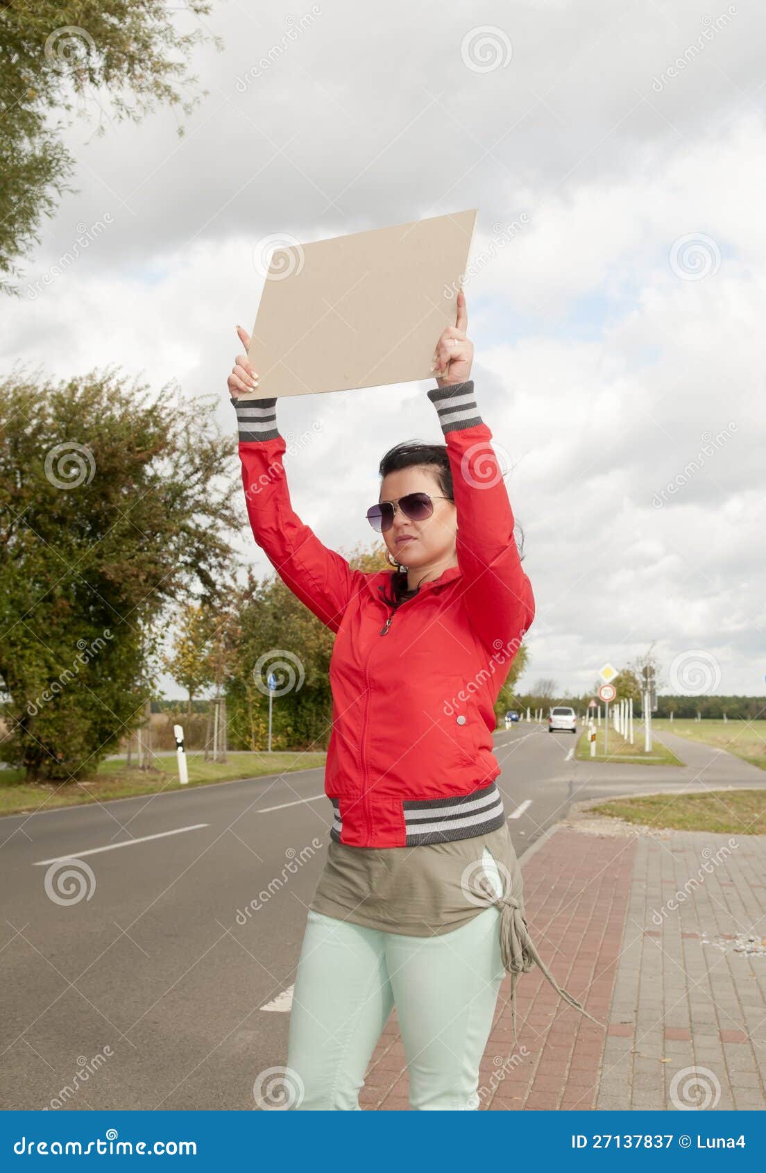 Hitchhiker with blank sign stock image. Image of female 27137837