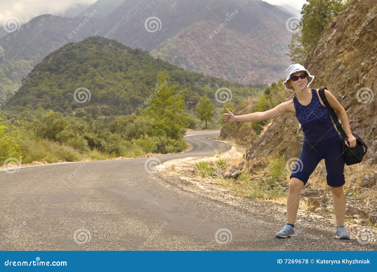 Hitchhiker on the Road in Mountains Stock Photo Image of hitchhiker
