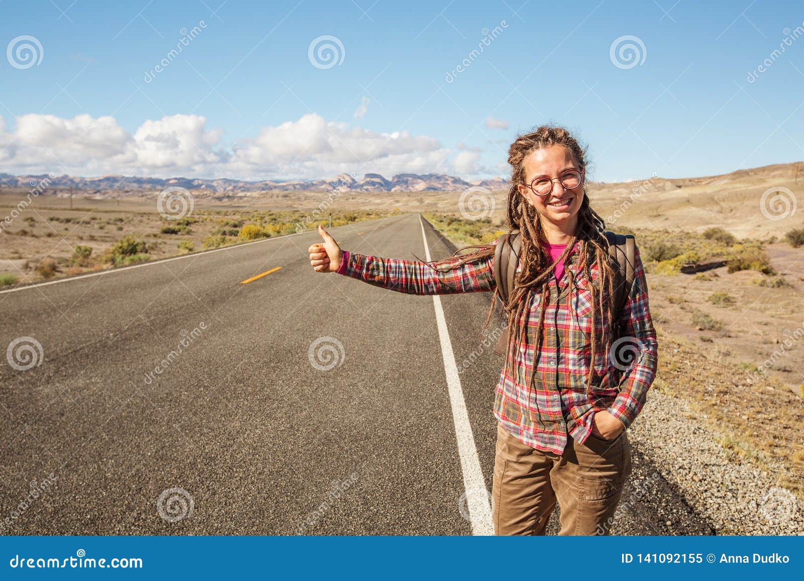 Hitchhiker Woman Walking on a Road in USA Stock Image - Image of ...