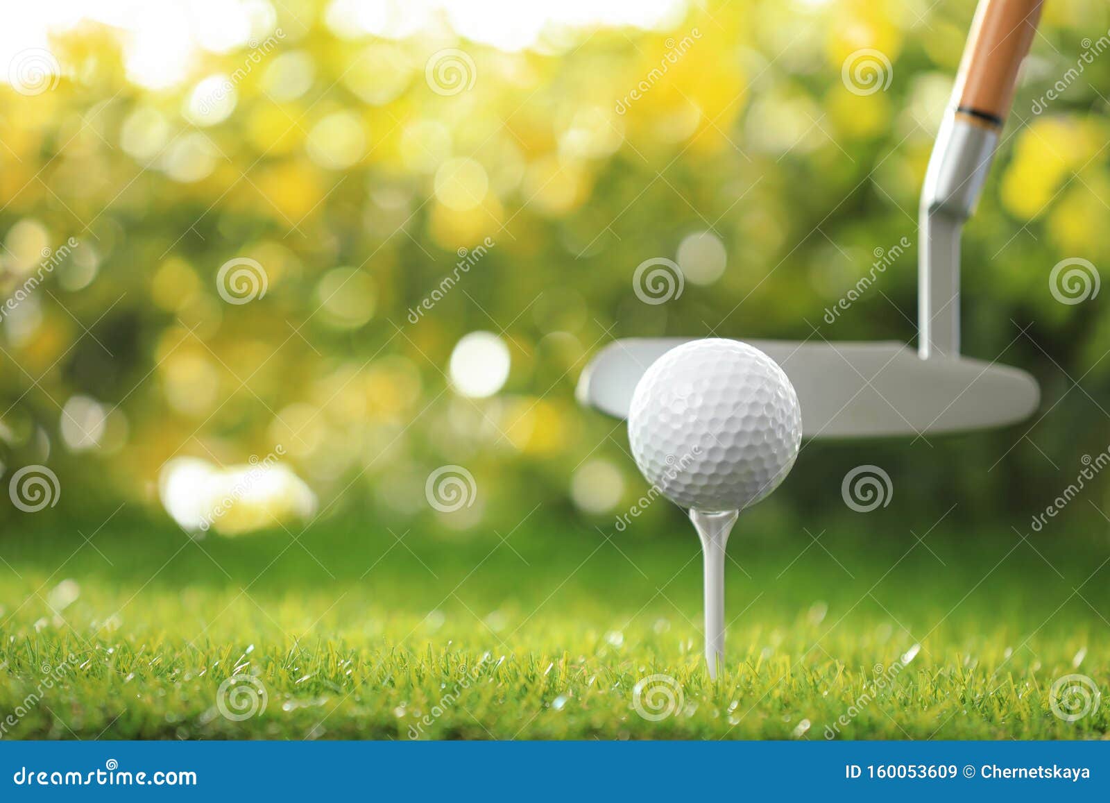 Hitting Golf Ball with Club on Course Stock Image Image of bokeh