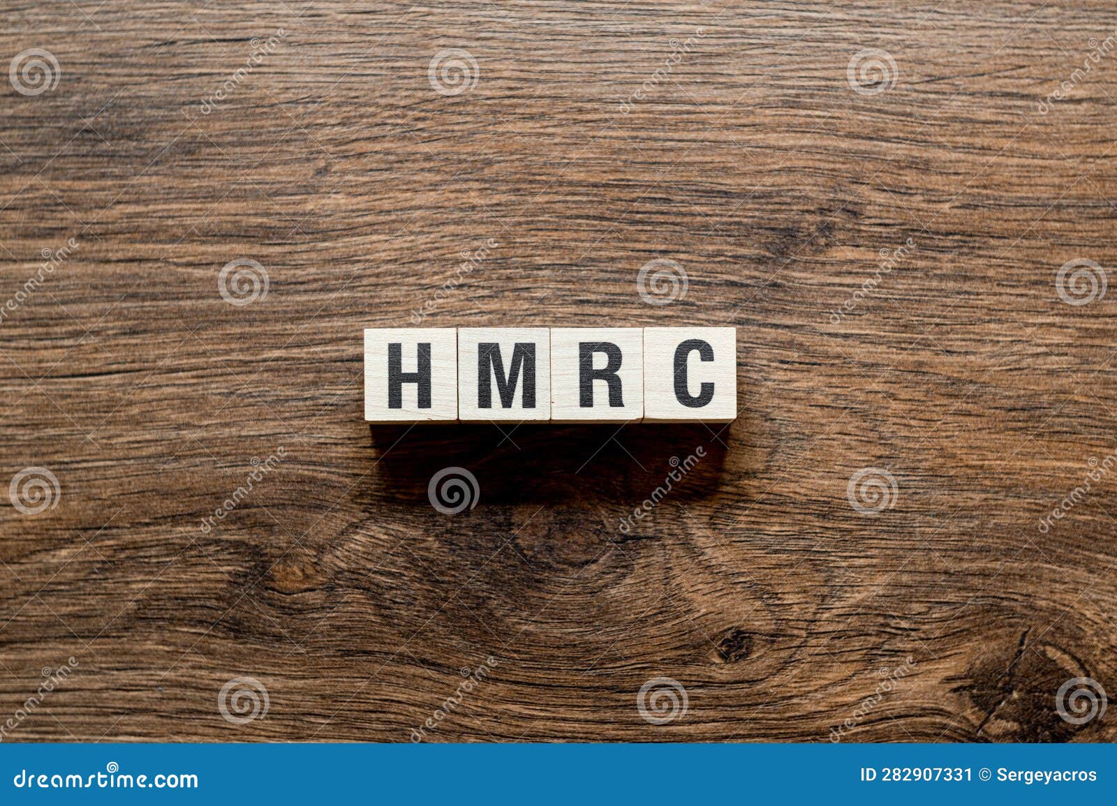 hmrc - majestys revenue and customs,word concept on building blocks, text