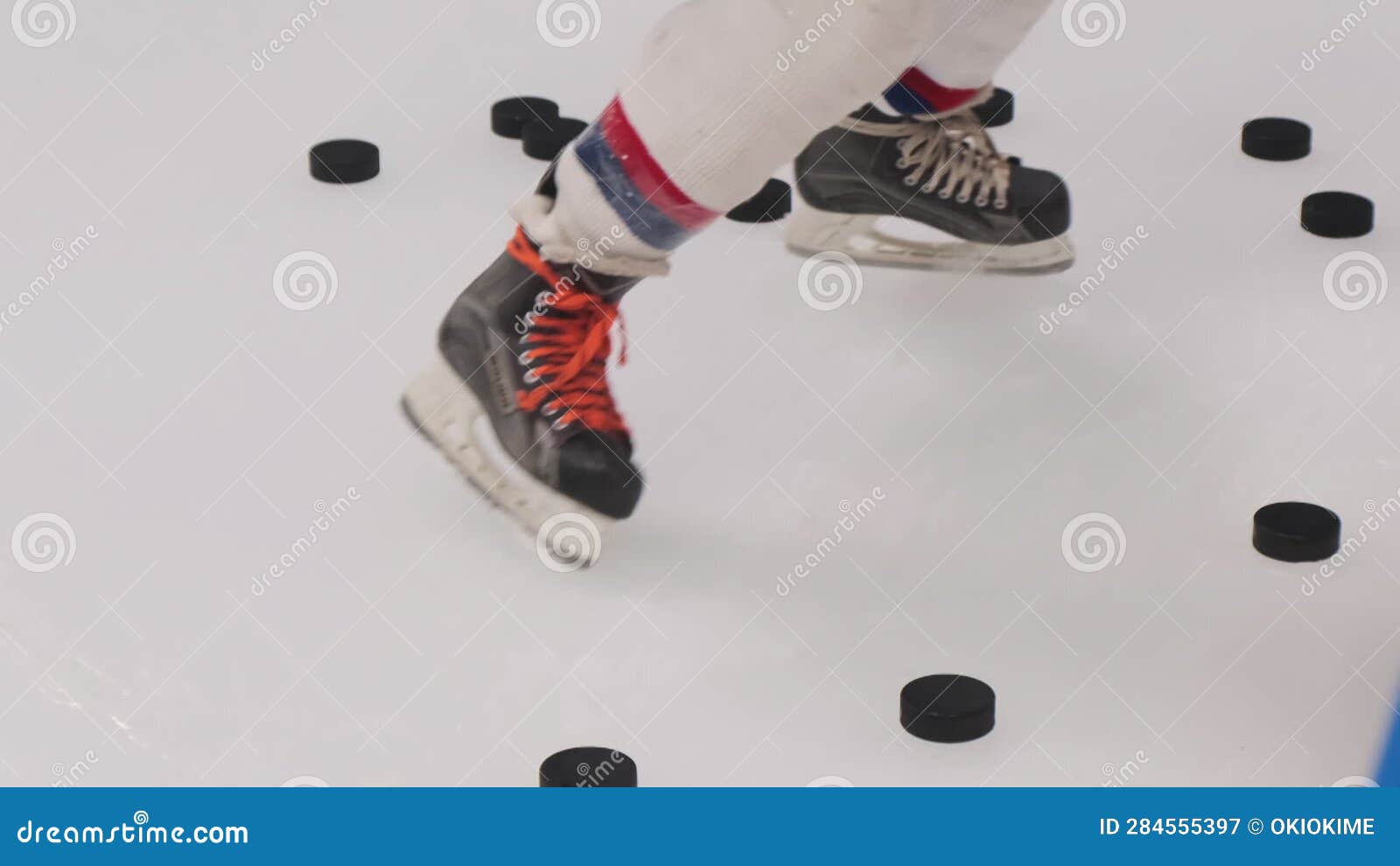 Hockey Player Training with Pucks before Match on Ice Arena Stock Video