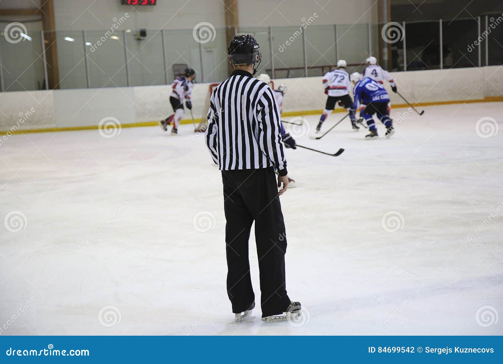 Hockey referee control editorial photography. Image of black 84699542