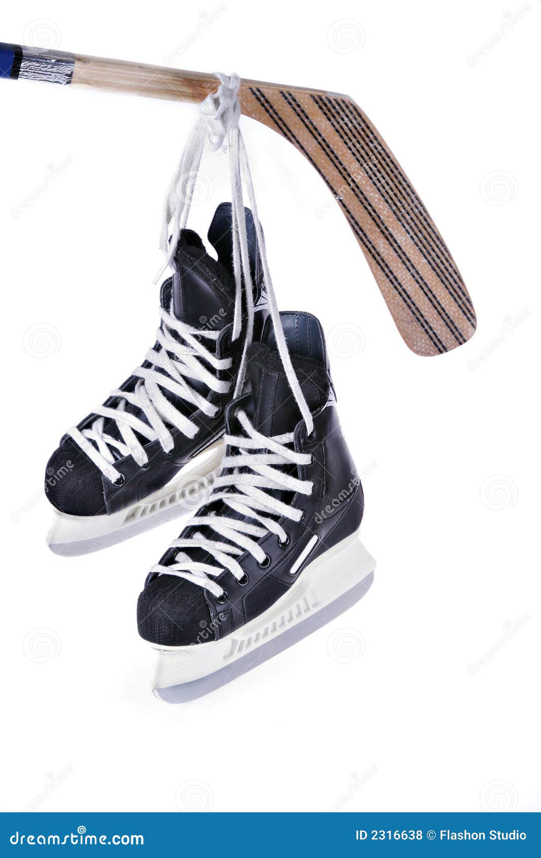 hockey skates and stick