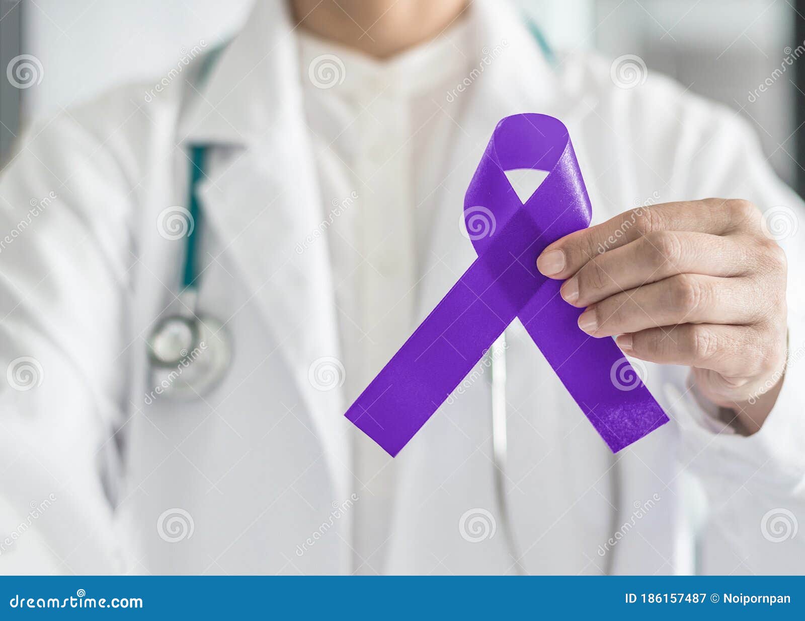 hodgkin`s lymphoma and testicular cancer awareness violet ribbon ic bow color on doctorÃ¢â¬â¢s hand support