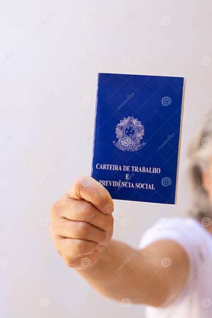 Holding A Brazil Work Permit Card Isolated On White Background Concept Image Stock Photo Holding A Brazil Work Permit Card Isolated On White Background Concept Image Stock Photo