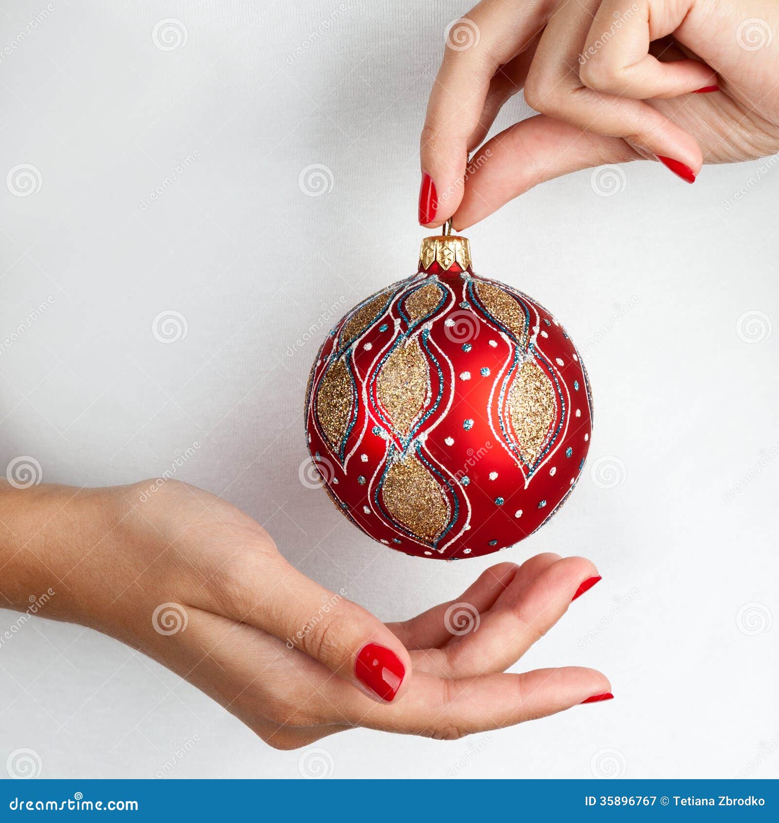 Holding christmas ball stock image. Image of human, bauble - 35896767