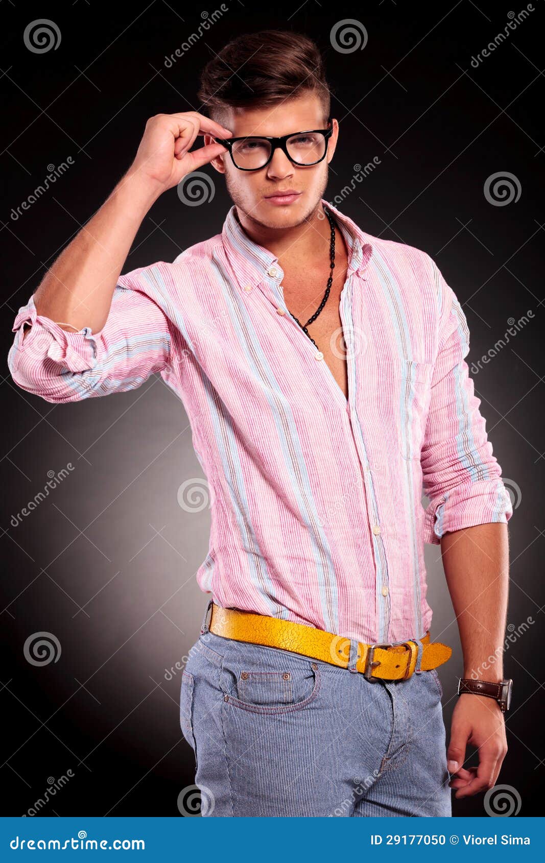 Holding Glasses & Looking at You Stock Photo Image of human, hair