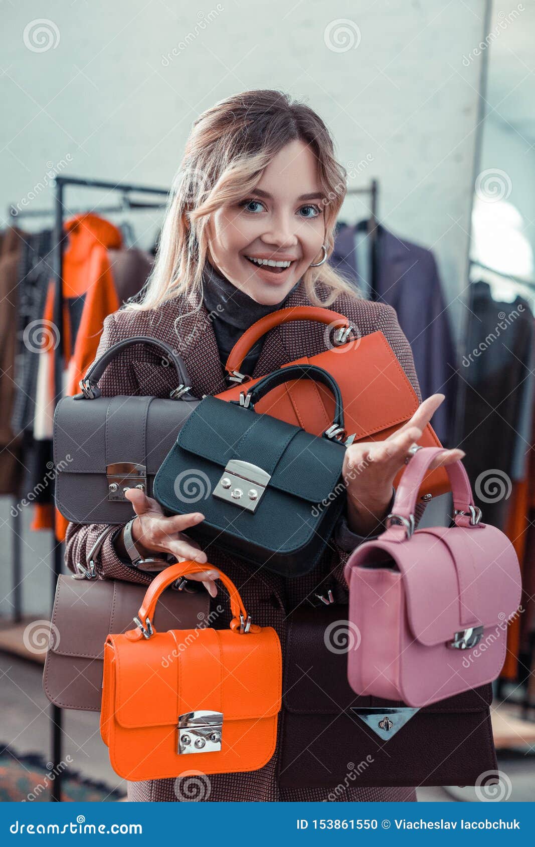 Businesswoman Owning Fashion Boutique Holding Little Hand Bags Stock ...