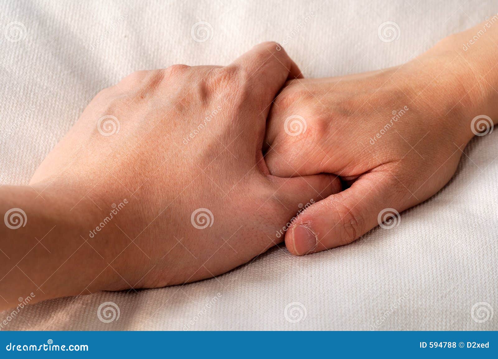 holding hands in bed