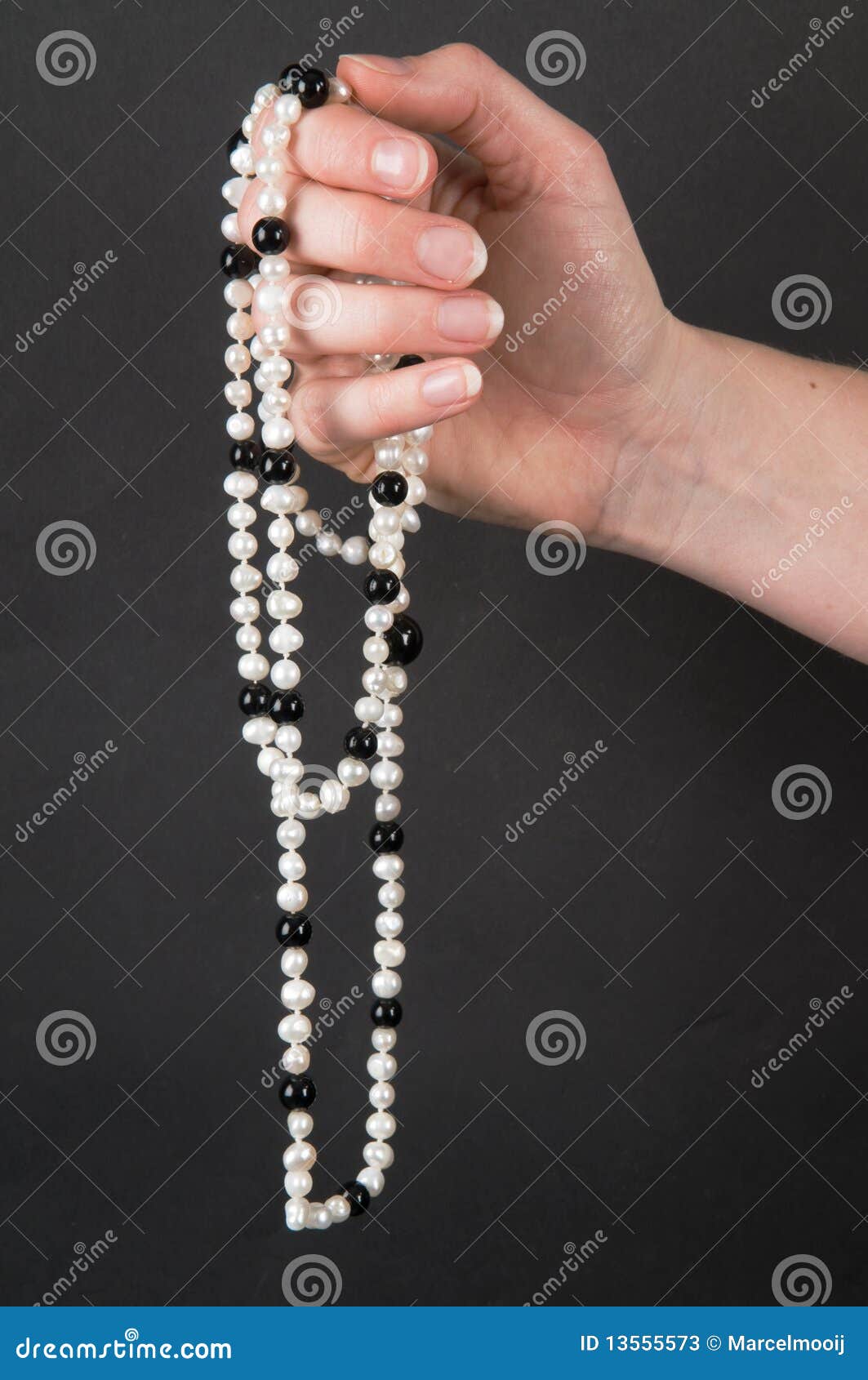 Holding a Necklace stock image. Image of jewelry, female 13555573