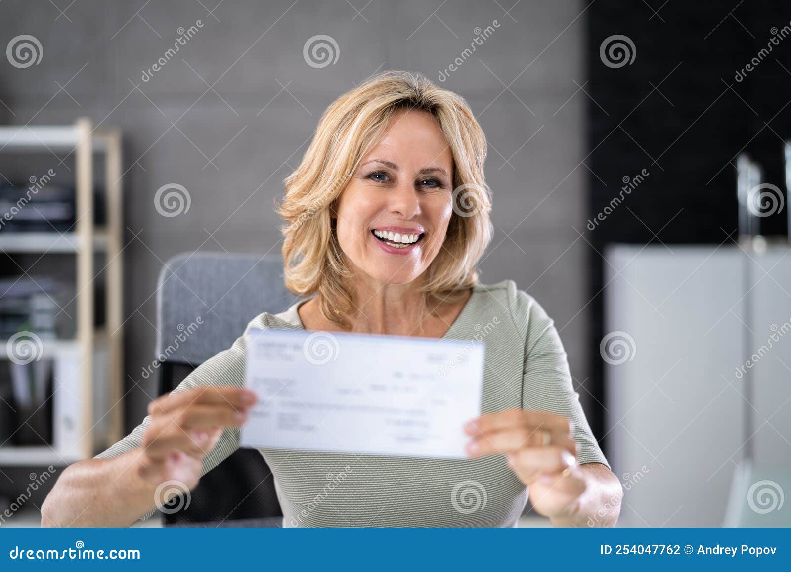 Holding Paycheck or Payroll Check or Insurance Cheque Stock Photo Image of finance, company