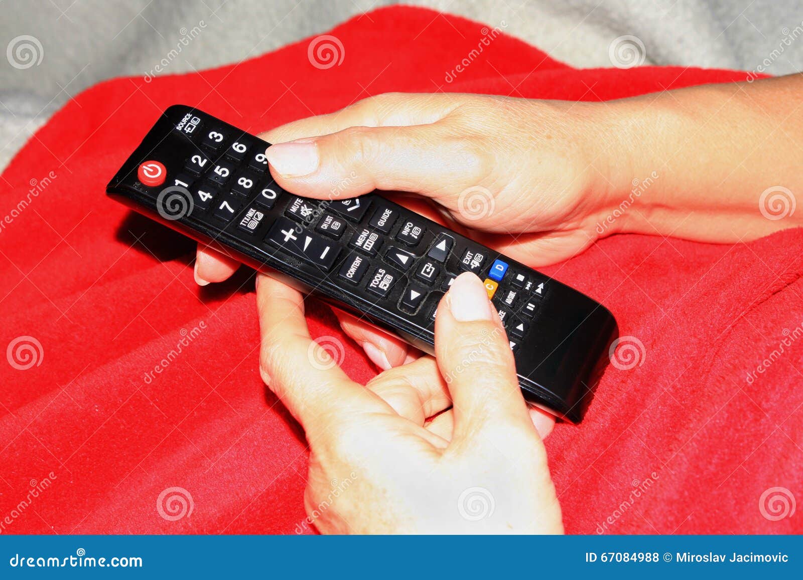 Holding Remote Control with Two Hands Stock Photo Image of hands