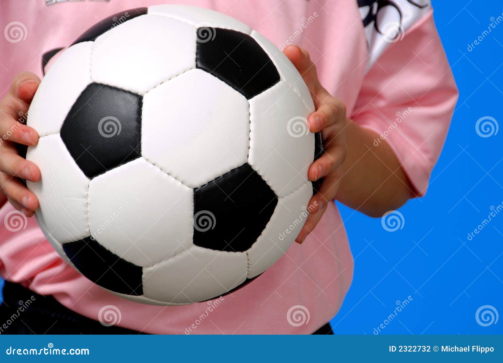 Holding soccer or football stock photo. Image of female 2322732