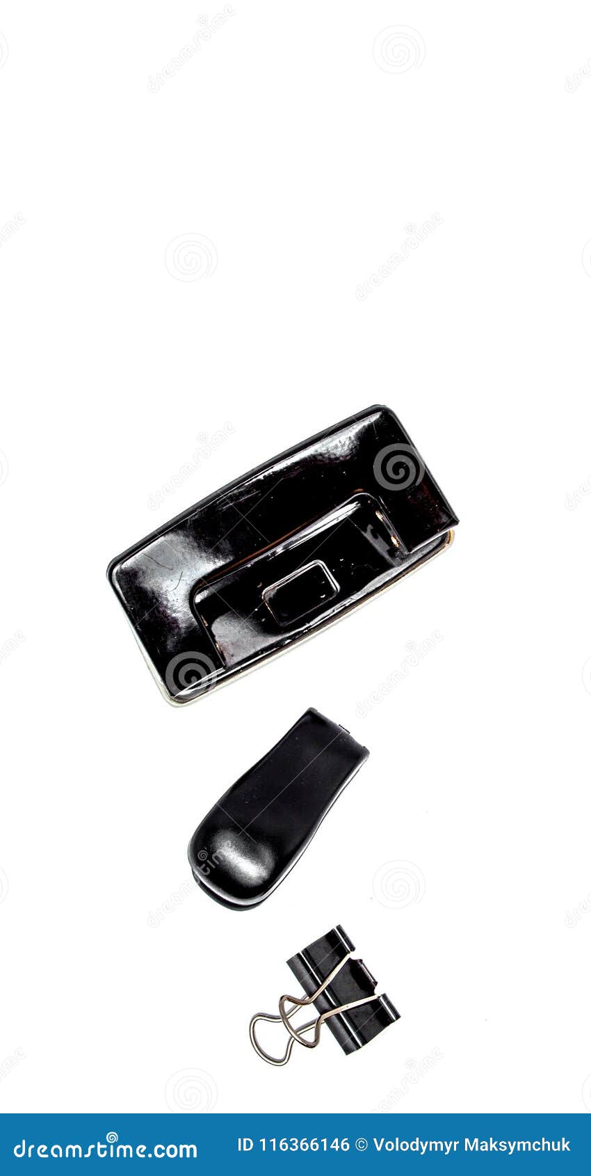 Hole Puncher, Staple Puller or Staple Remover and Paper Clips Isolated