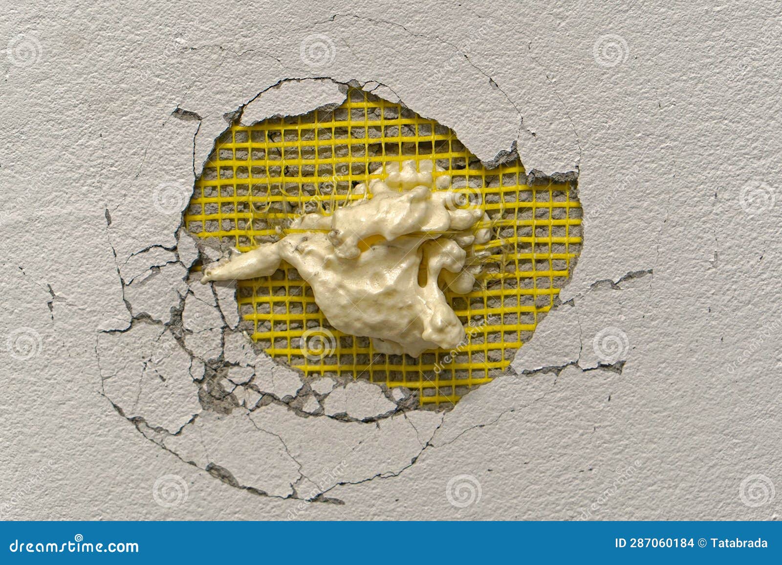 Hole in wall insulation stock photo. Image of repair 287060184