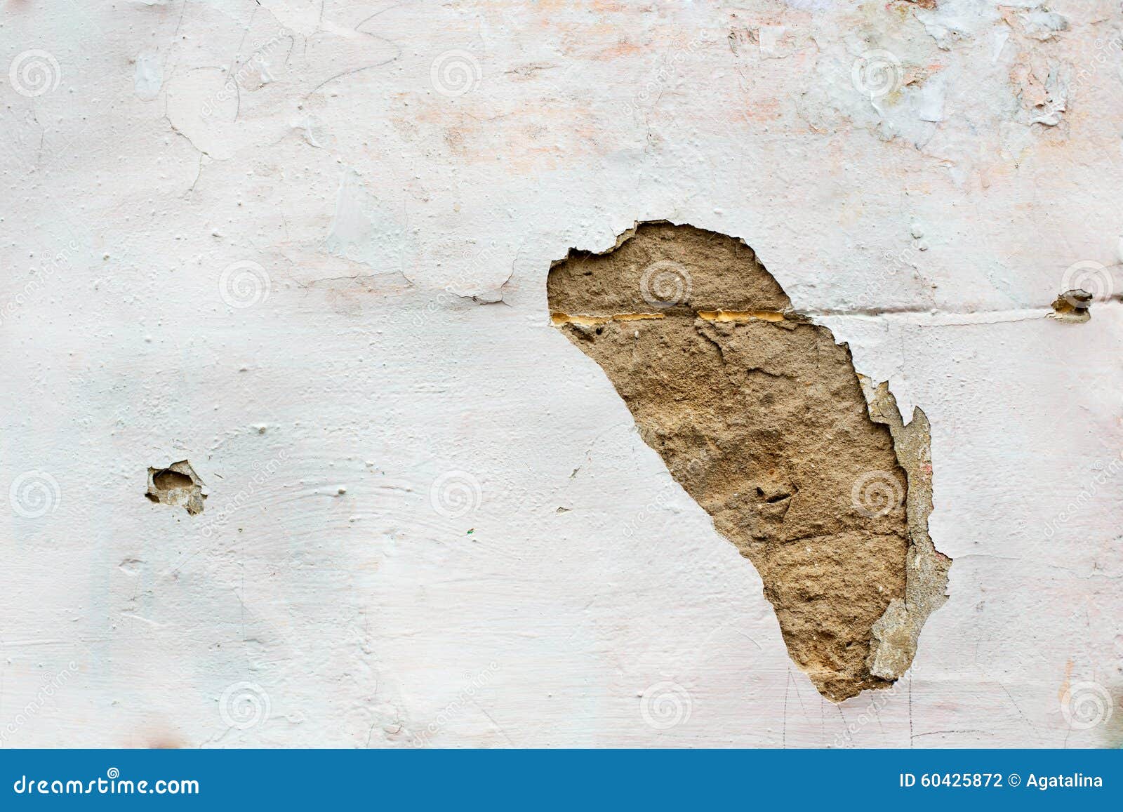 Hole in wall plaster stock photo. Image of urban, fortified 60425872
