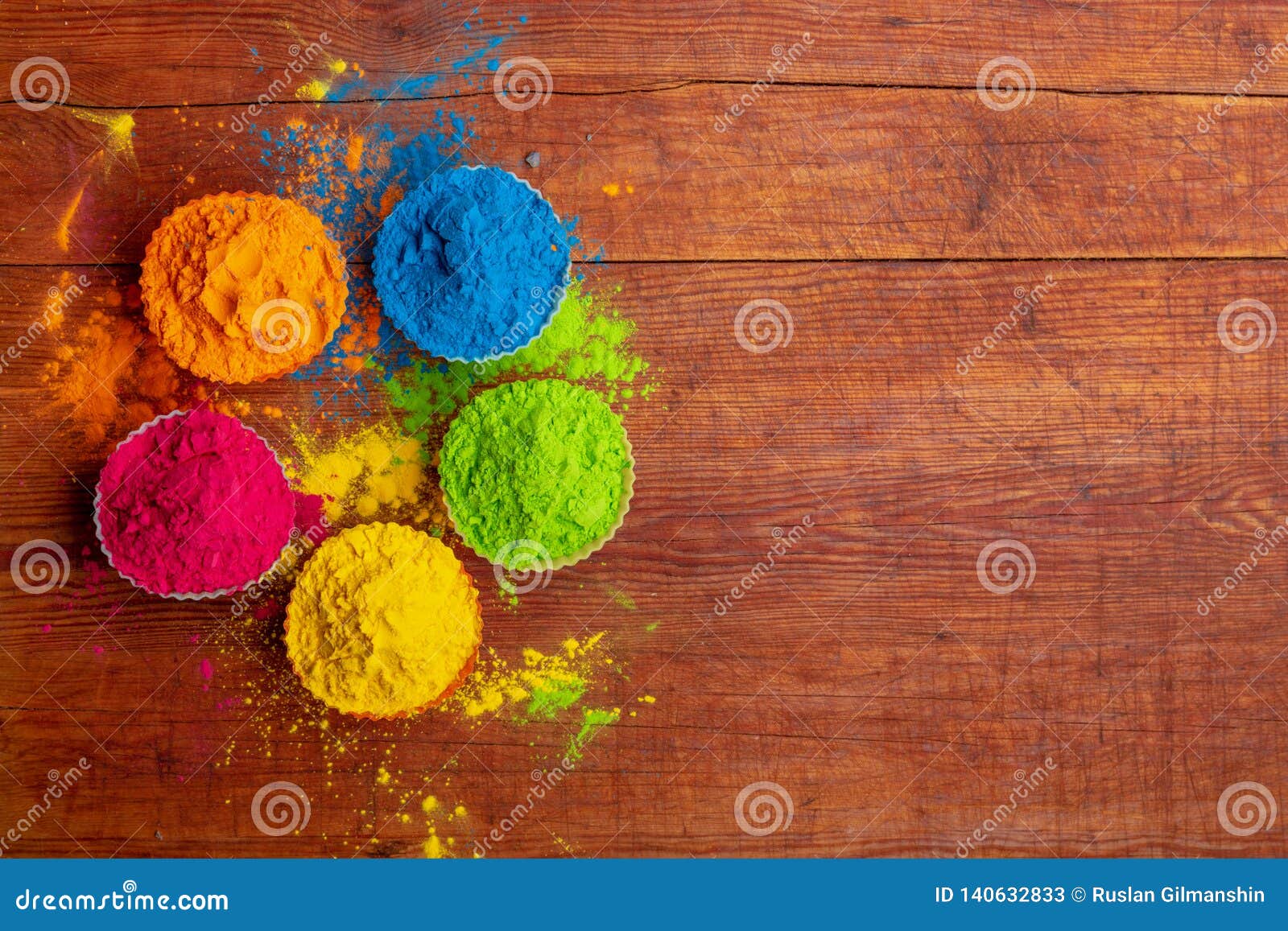 Holi color powder. Organic Gulal colours in bowl for Holi festival