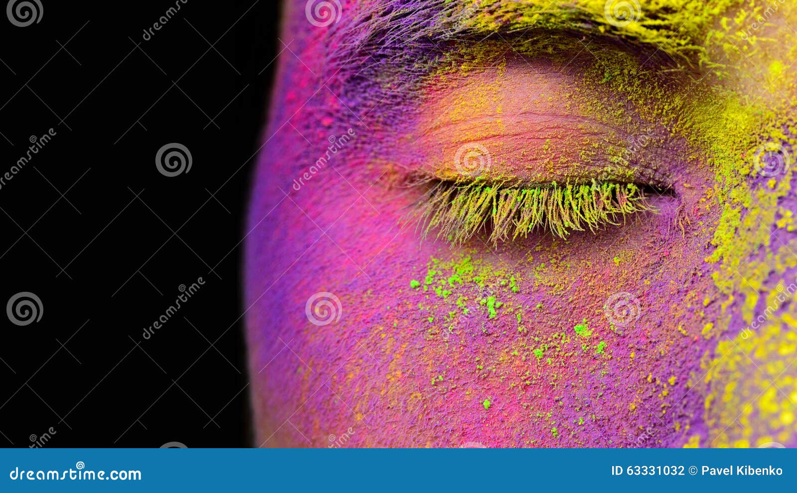 Makeup Brush Covered With Bright Holi Dry Powder Paint Stock Photo