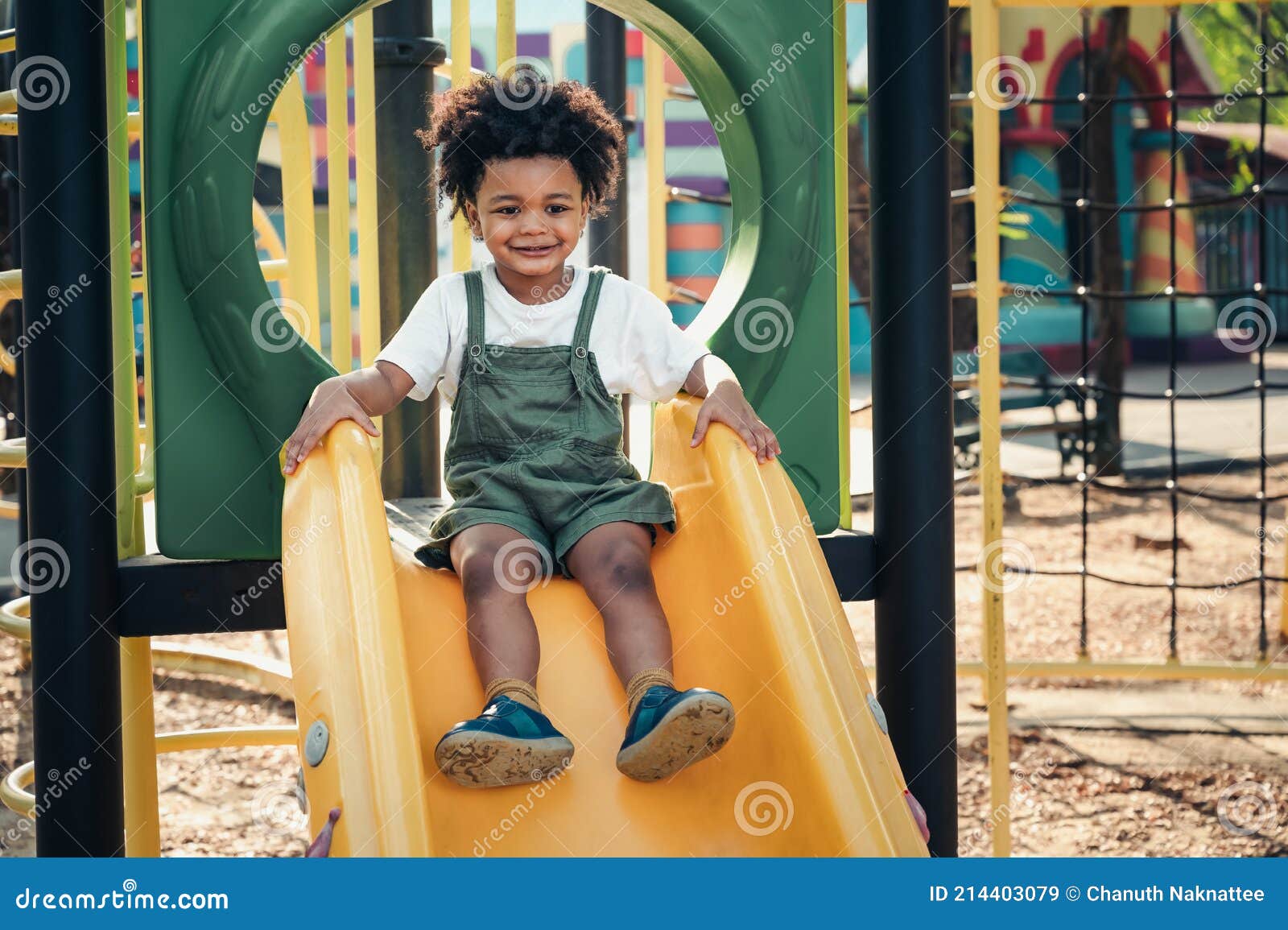Happy Black People Child Playing Slide In Playground Royalty Free Stock