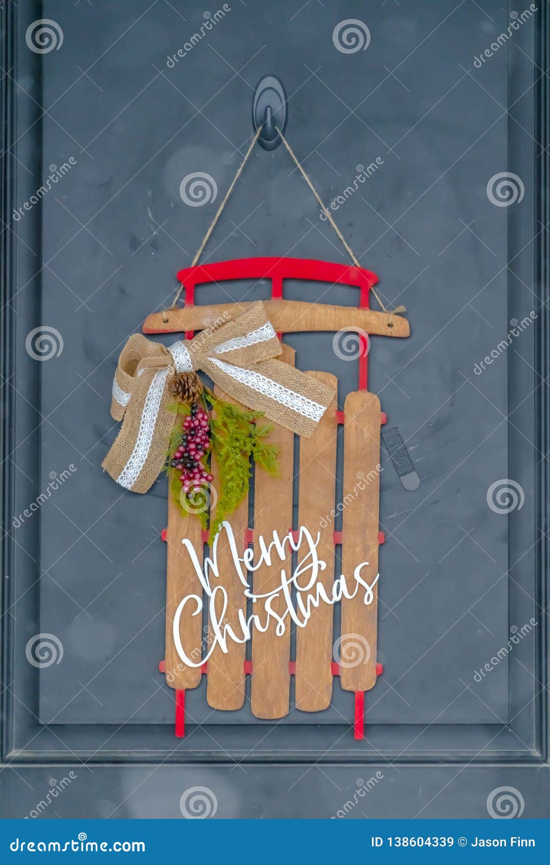 A Holiday Entryway With Christmas Door Decoration Stock
