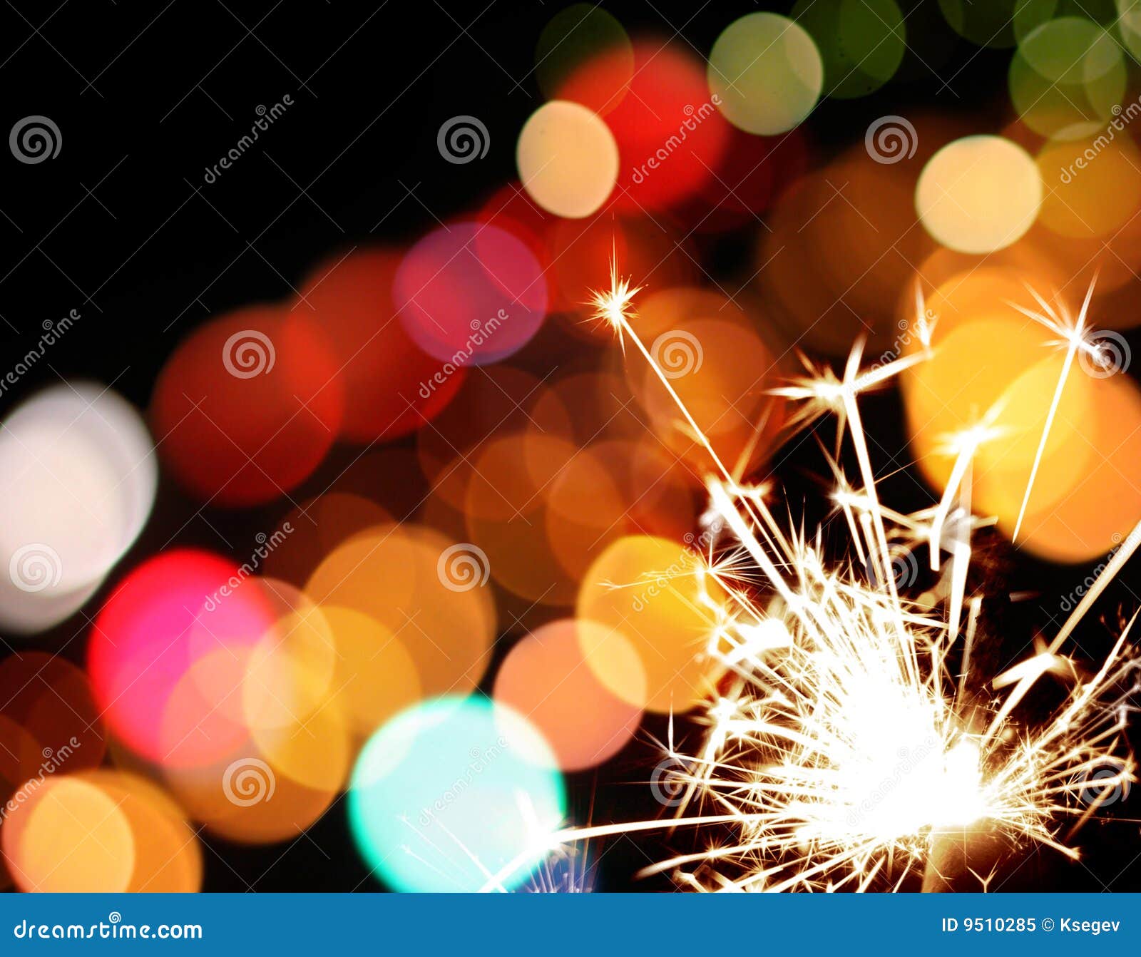 Holiday Sparkler and Colorful Lights Stock Image Image of night
