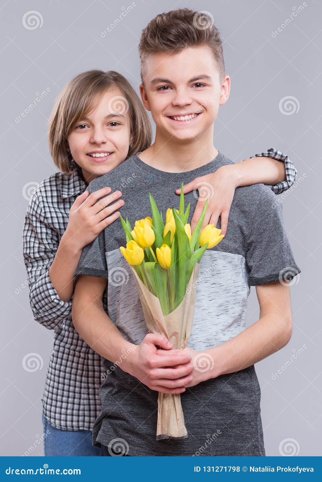 Teen Boy And Girl With Flowers Stock Photo Image Of Bouqu