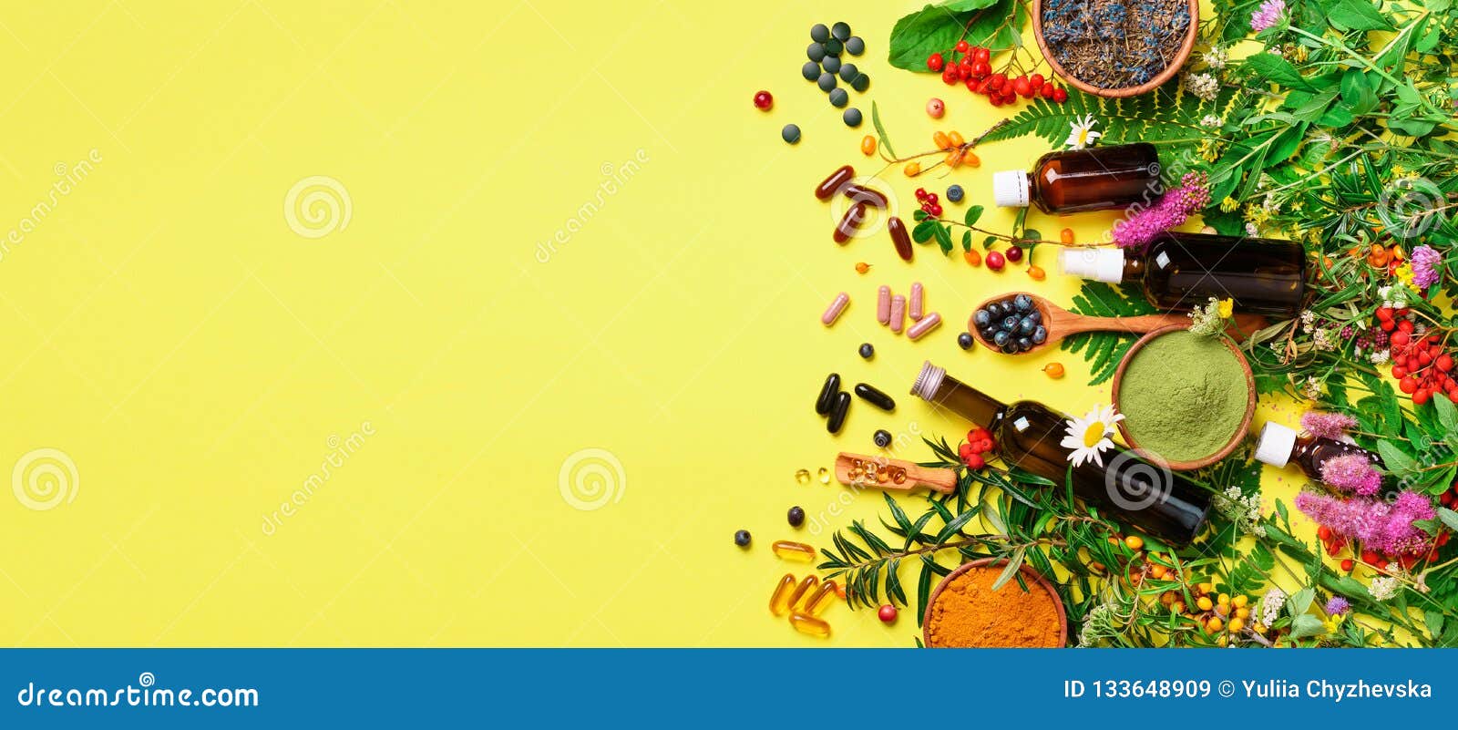 holistic medicine approach. healthy food eating, dietary supplements, healing herbs and flowers. turmeric, dried lavender,