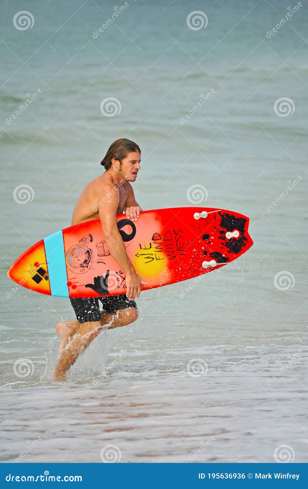 Surfers Carry Surfboard Onto the Beach Editorial Photo - Image of ...
