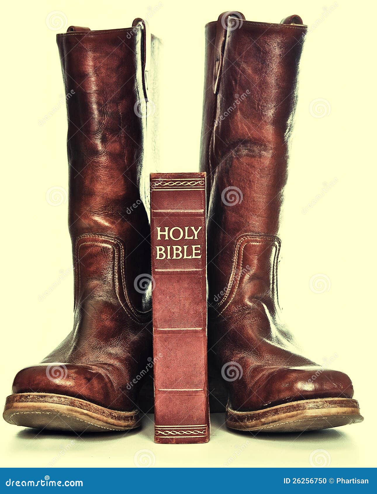 holy bible and rugged cowboy boots