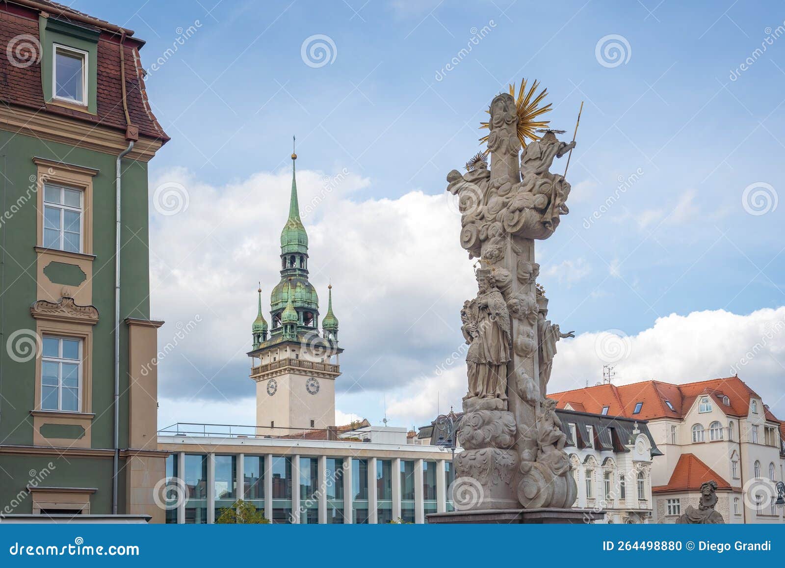 holy trinity column at cabbage market square zelny trh and old town hall tower - brno, czech republic