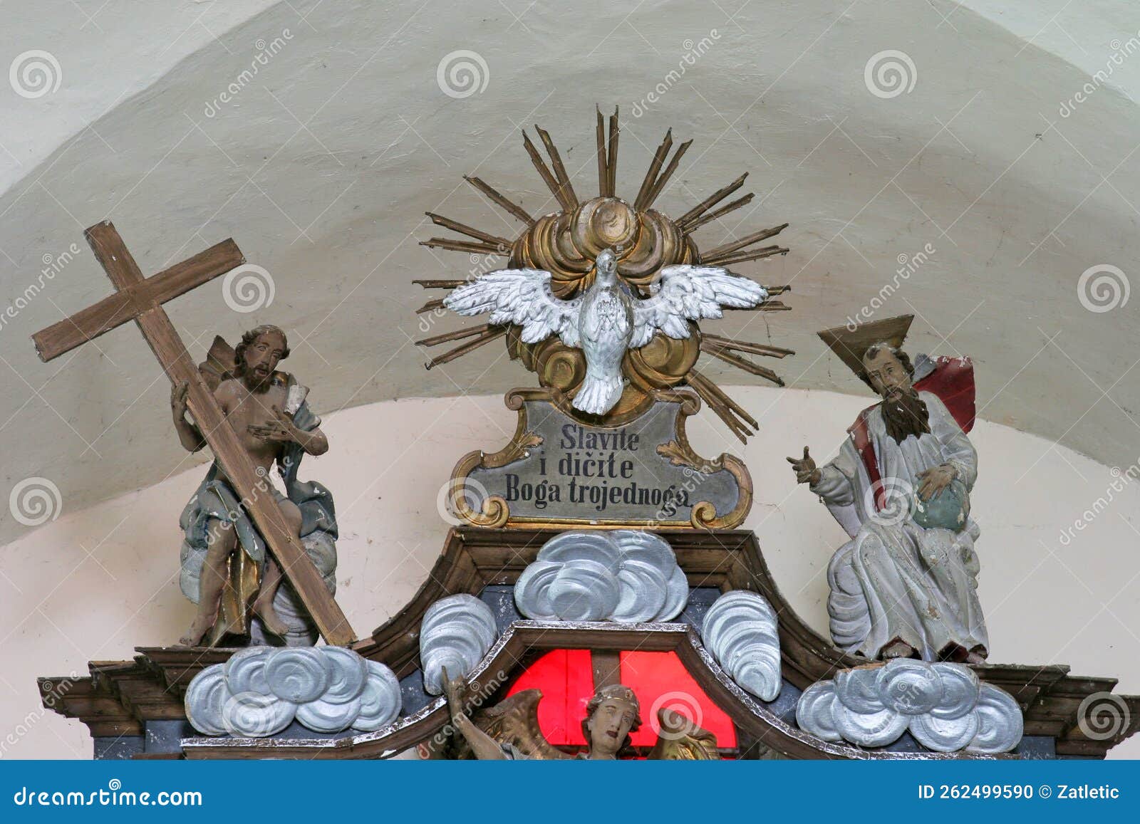 holy trinity, statue on the altar adoration of the magi in the church saint george in durdic, croatia