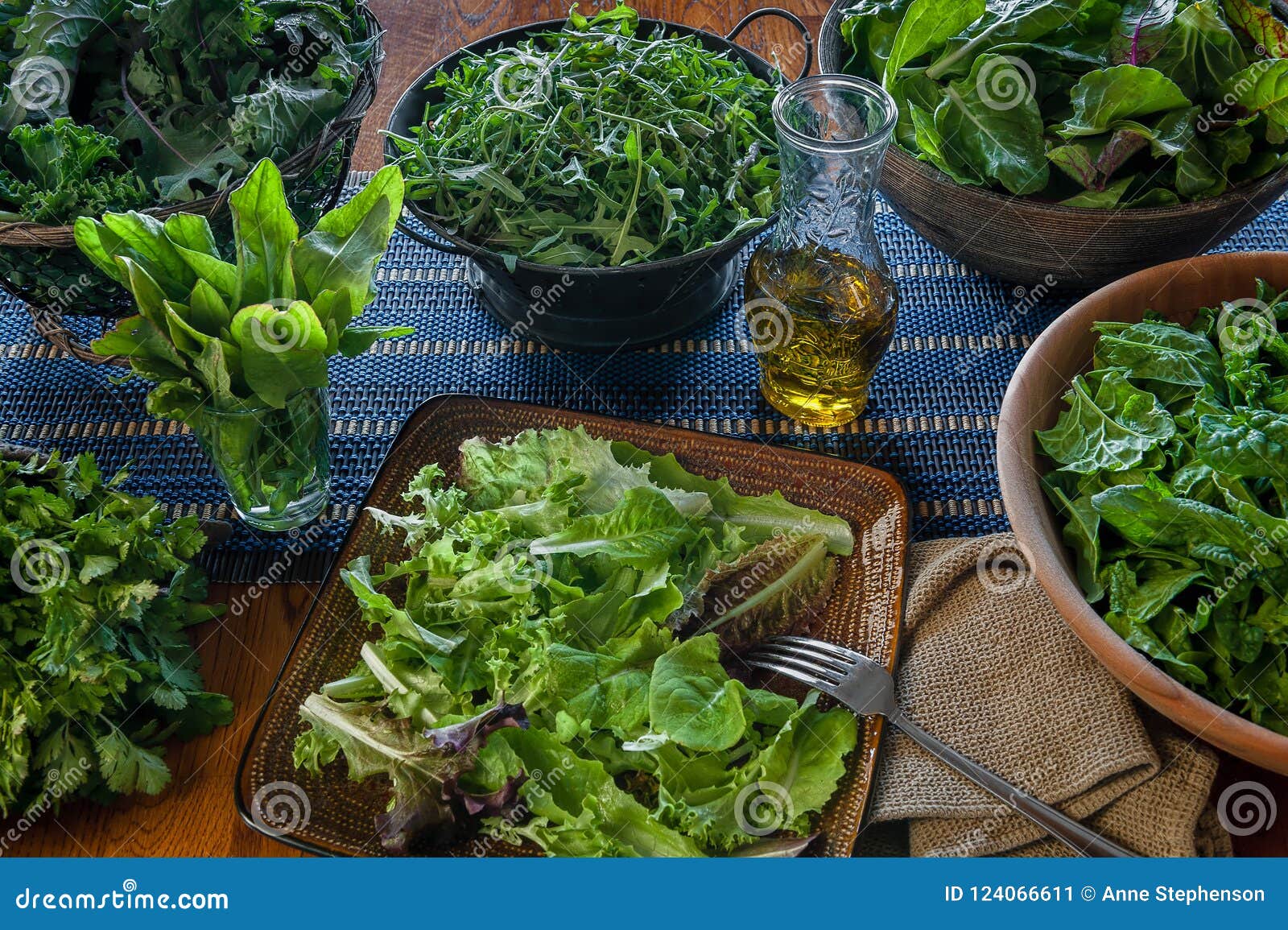 a variety of freshly picked leafy greens ready for salad making