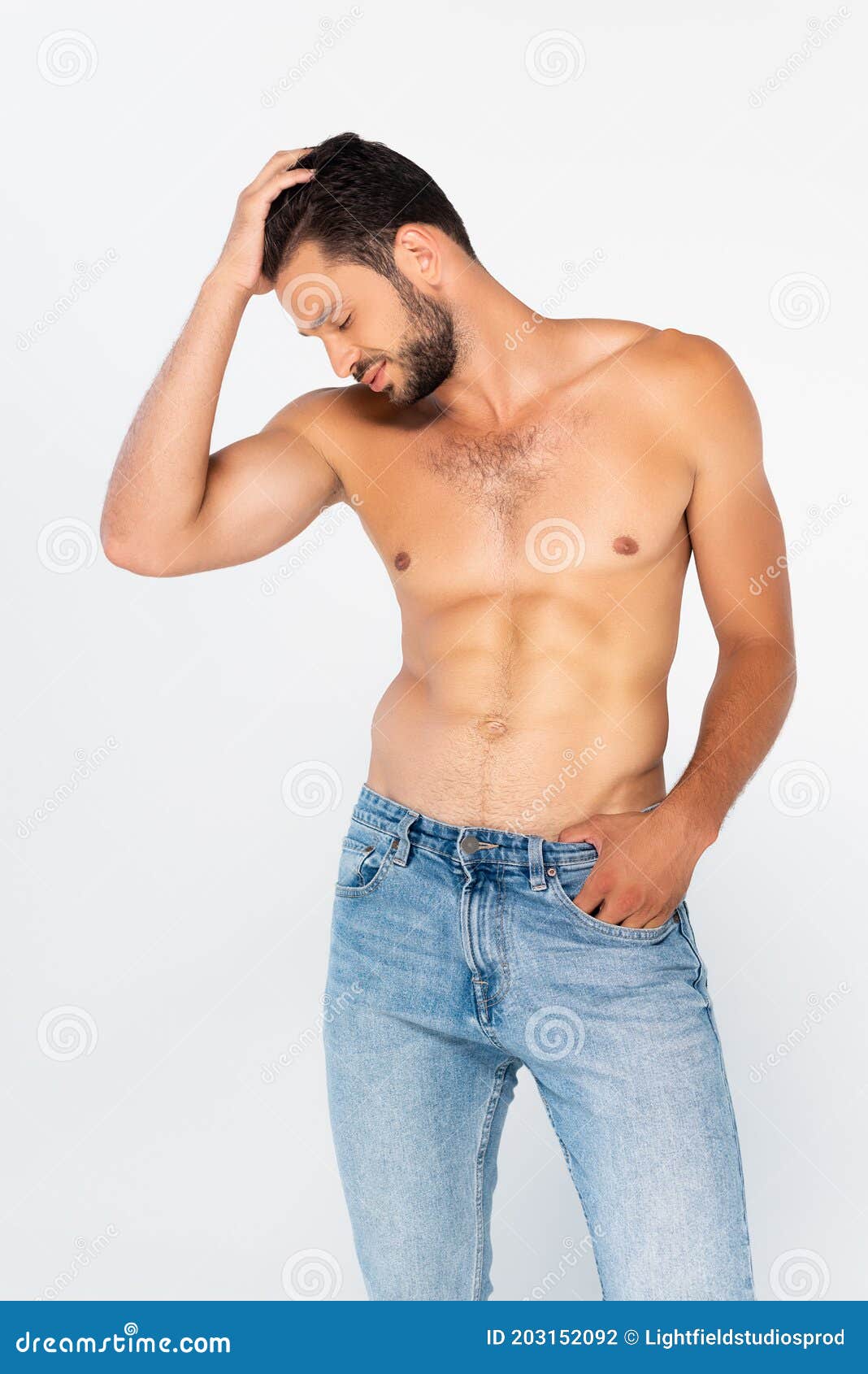 Hombre En Jeans De Pie Con La Mano Foto de archivo - Imagen de tacto,  vaqueros: 203152092