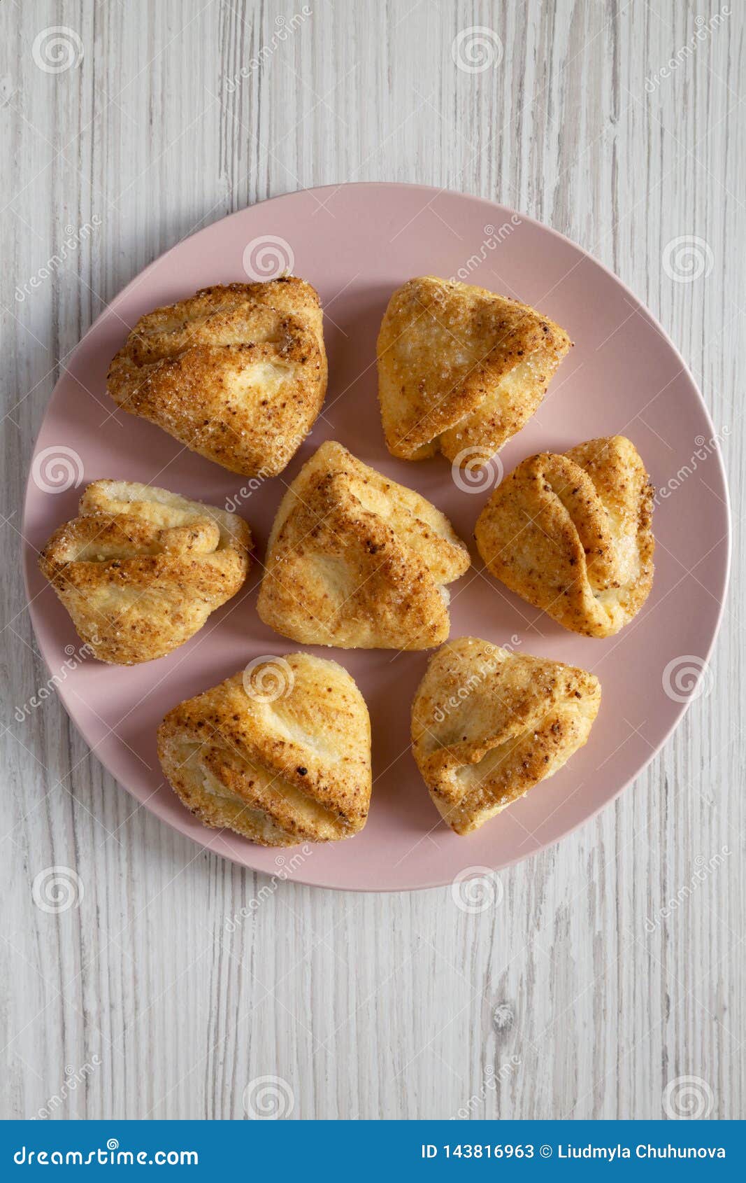 Home Baked Cottage Cheese Biscuits On Pink Plate Over White Wooden