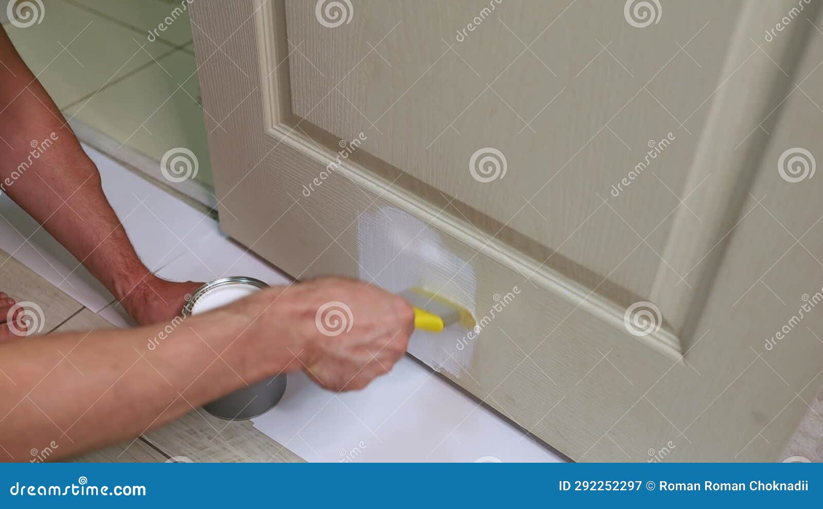 A Home Builder Paints Doors with a Paint Brush Stock Video Video of