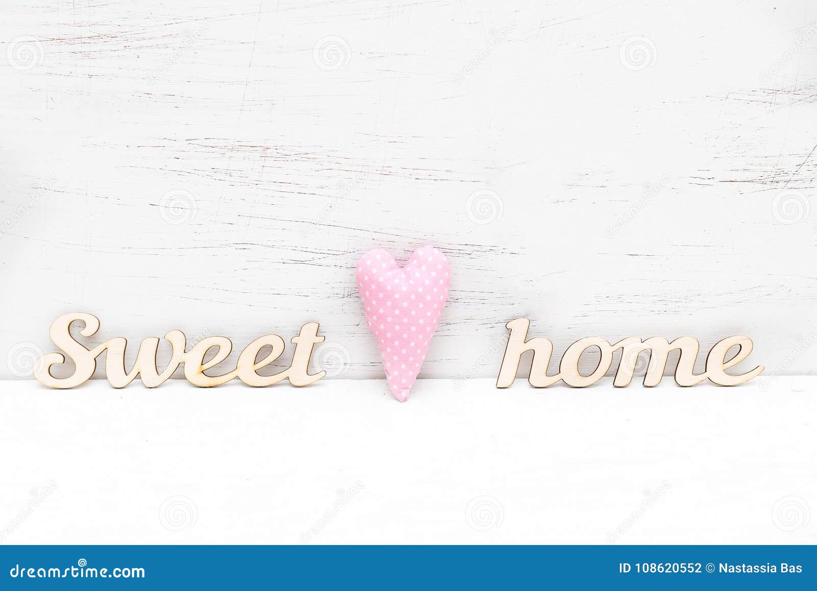 home decor. wooden inscription sweet home on a wooden background