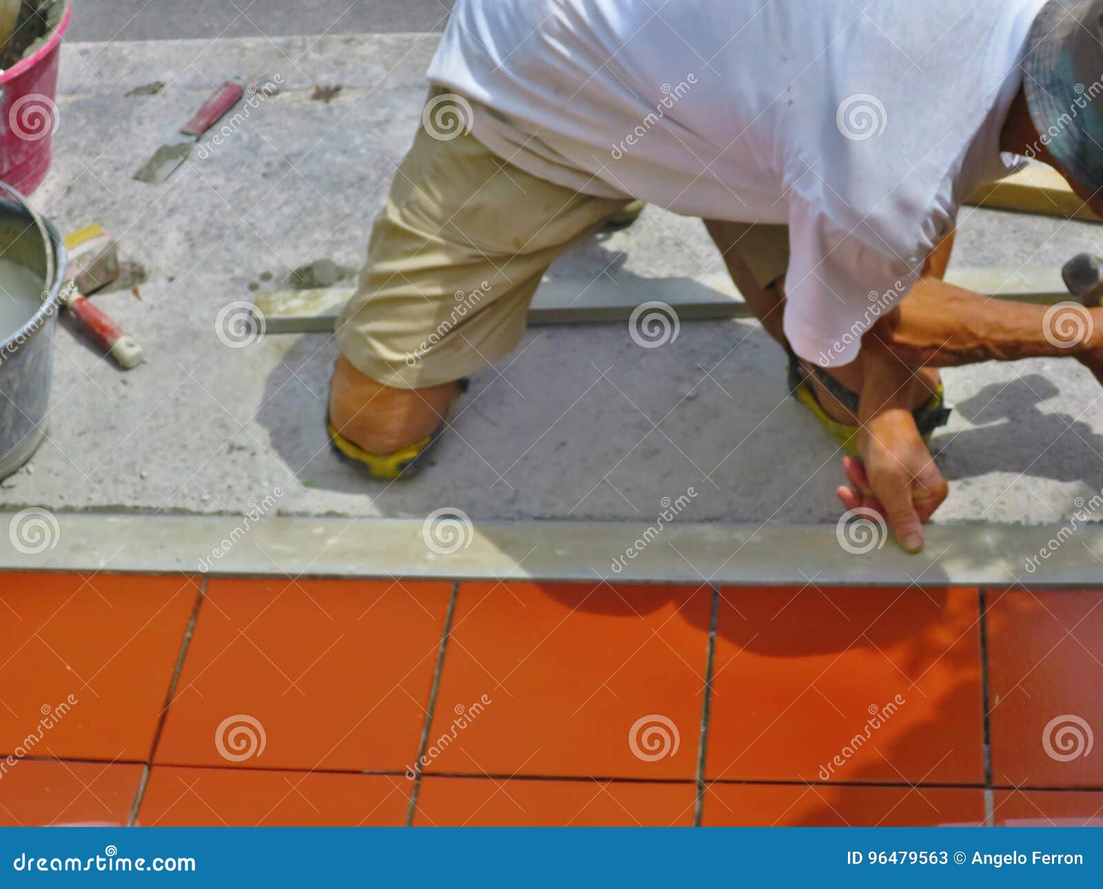 Home Improvement, Renovation Construction Worker Tiler is Tiling