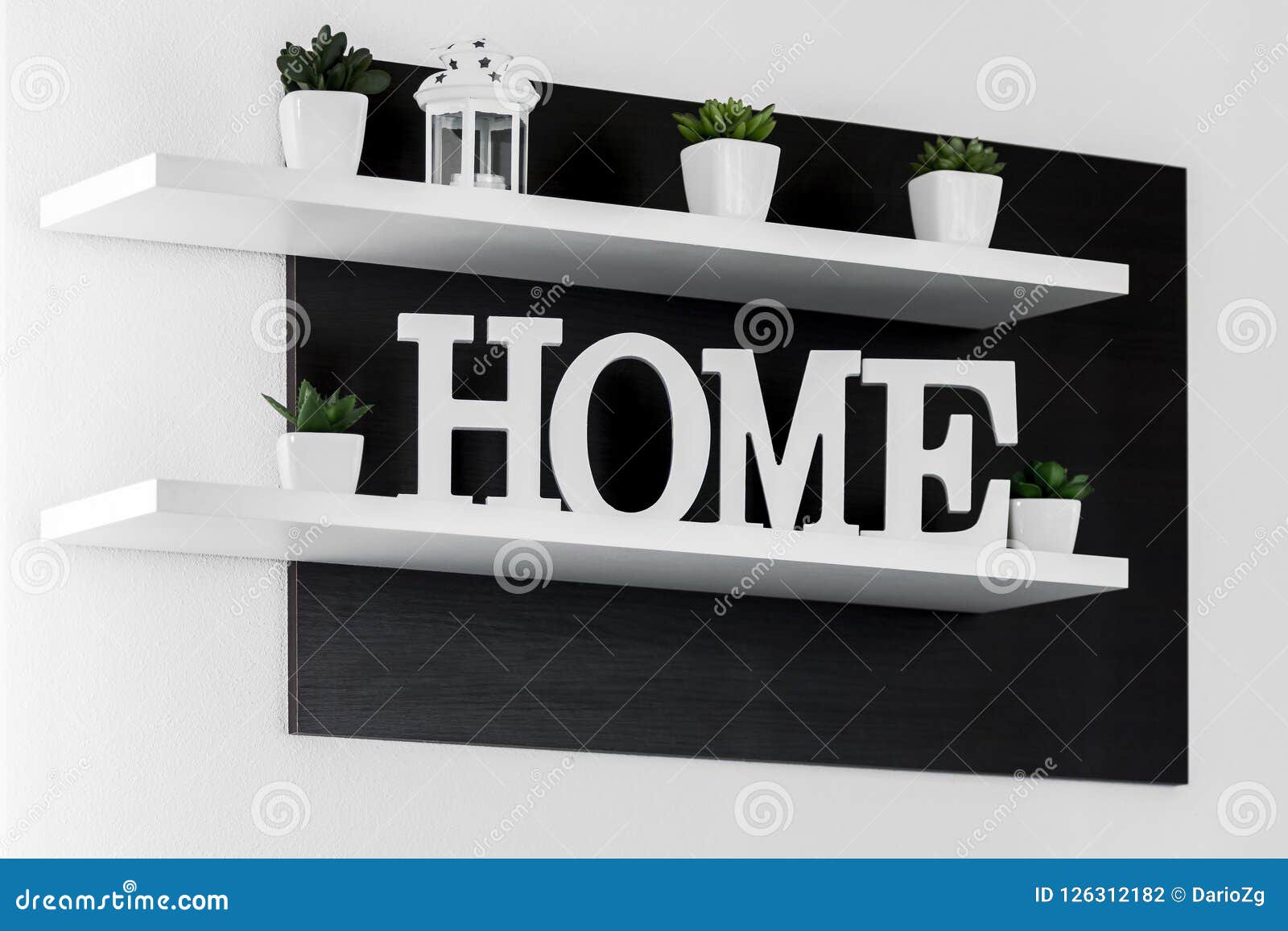 Home Letters Decor on White Shelf Stock Photo - Image of