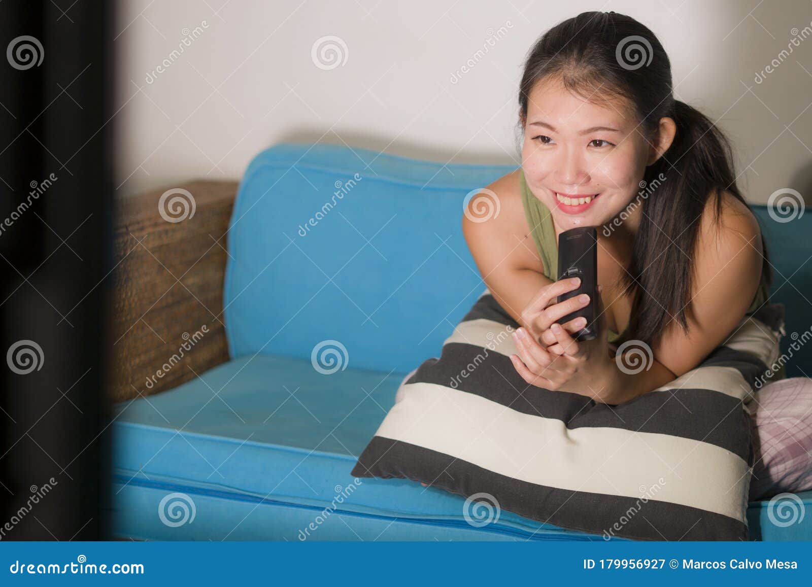 Young Happy And Beautiful Asian Korean Woman Watching Tv At Living Room Sofa Couch Enjoying Funny Television Korean Drama Show Or Stock Image Image Of People Indoors Young Happy And Beautiful Asian Korean Woman Watching Tv At Living Room Sofa Couch Enjoying Funny Television Korean Drama Show Or Stock Image Image Of People Indoors