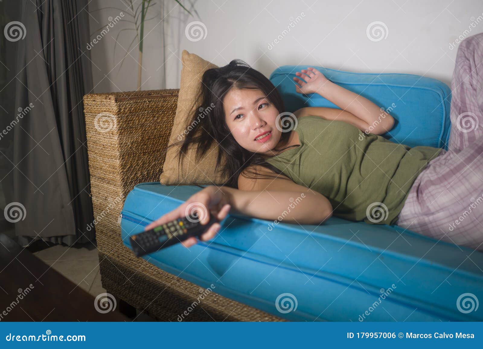Young Happy And Beautiful Asian Korean Woman Watching Tv At Living Room Sofa Couch Enjoying Funny Television Korean Drama Show Or Stock Photo Image Of Beautiful Emotion Young Happy And Beautiful Asian Korean Woman Watching Tv At Living Room Sofa Couch Enjoying Funny Television Korean Drama Show Or Stock Photo Image Of Beautiful Emotion