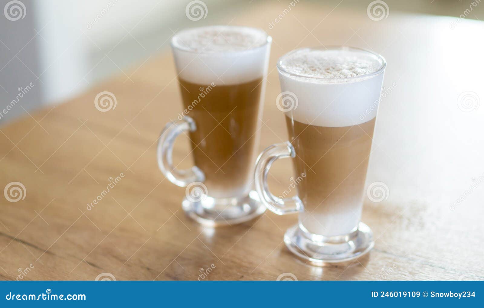 home made coffee cafe macchiato on wooden table.