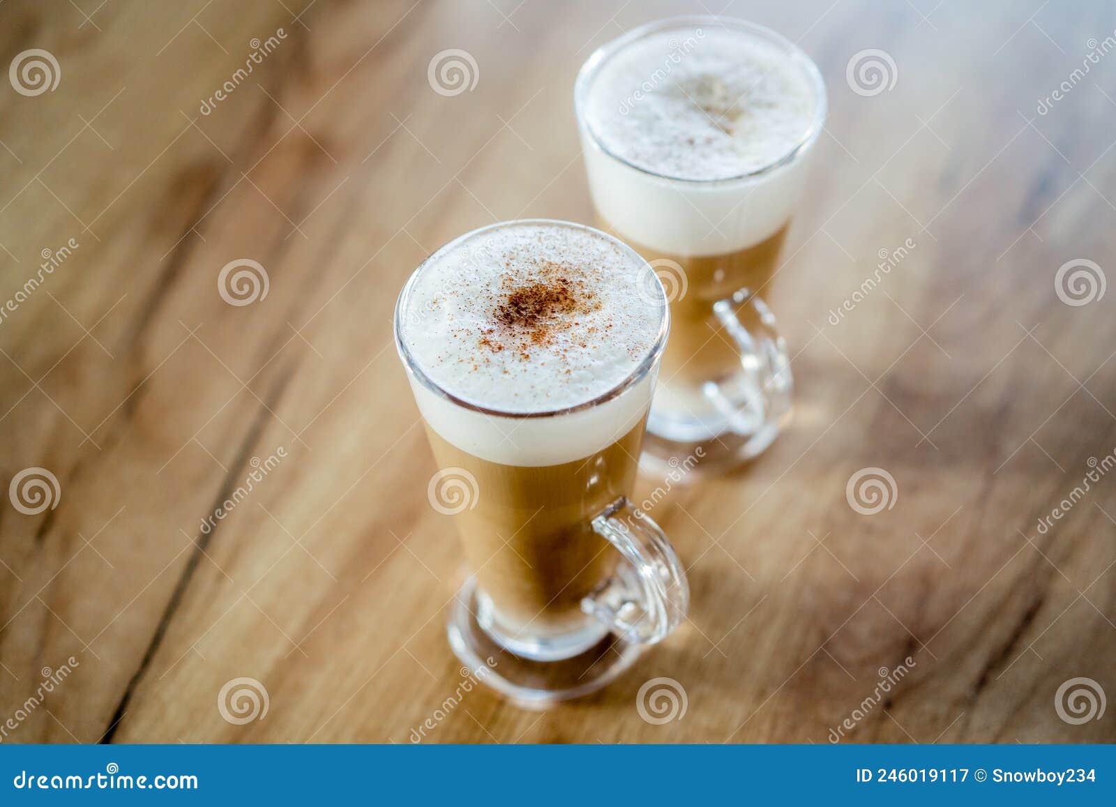 home made coffee cafe macchiato on wooden table.